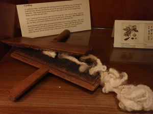 Carding materials and historic iron artifacts were on loan from the WCU Mountain Heritage.